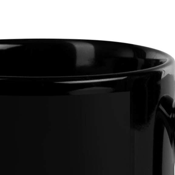 Black mug with white text on a white background